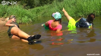 Three luscious ladies get soaked exercising in a river Screencap 72 on www.sinx.com