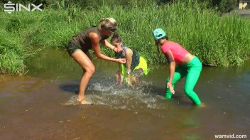 Three luscious ladies get soaked exercising in a river Screencap 81 on www.sinx.com