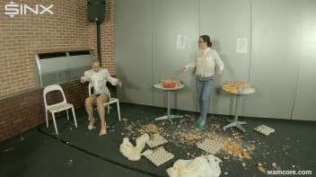 Playful businesswomen cover each other in raw egg Screencap 2 on www.sinx.com