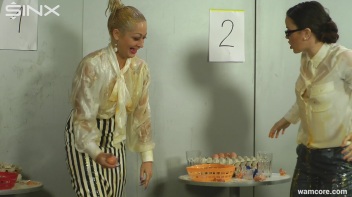 Playful businesswomen cover each other in raw egg Screencap 27 on www.sinx.com