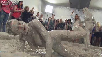Muddy Wrestling: Satin, Skirts, and Audience Mud Blasted To The Max!  Everyone Gets A Taste! Screencap 105 on www.sinx.com