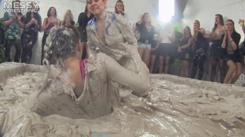 Muddy Wrestling: Satin, Skirts, and Audience Mud Blasted To The Max!  Everyone Gets A Taste! Screencap 16 on www.sinx.com
