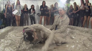 Muddy Wrestling: Satin, Skirts, and Audience Mud Blasted To The Max!  Everyone Gets A Taste! Screencap 20 on www.sinx.com