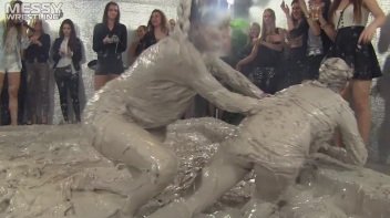 Muddy Wrestling: Satin, Skirts, and Audience Mud Blasted To The Max!  Everyone Gets A Taste! Screencap 21 on www.sinx.com