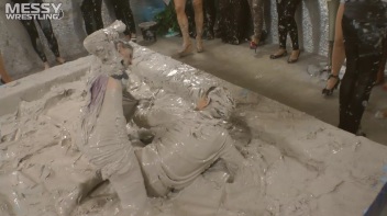 Muddy Wrestling: Satin, Skirts, and Audience Mud Blasted To The Max!  Everyone Gets A Taste! Screencap 24 on www.sinx.com