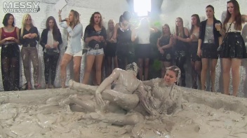Muddy Wrestling: Satin, Skirts, and Audience Mud Blasted To The Max!  Everyone Gets A Taste! Screencap 25 on www.sinx.com