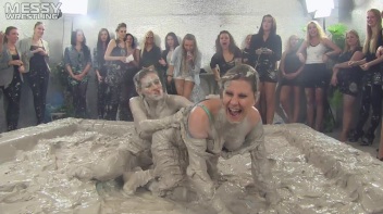 Muddy Wrestling: Satin, Skirts, and Audience Mud Blasted To The Max!  Everyone Gets A Taste! Screencap 27 on www.sinx.com