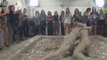 Muddy Wrestling: Satin, Skirts, and Audience Mud Blasted To The Max!  Everyone Gets A Taste! Screencap 29 on www.sinx.com