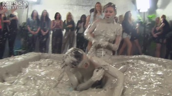 Muddy Wrestling: Satin, Skirts, and Audience Mud Blasted To The Max!  Everyone Gets A Taste! Screencap 32 on www.sinx.com