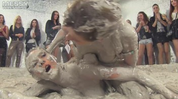 Muddy Wrestling: Satin, Skirts, and Audience Mud Blasted To The Max!  Everyone Gets A Taste! Screencap 34 on www.sinx.com