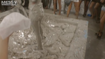 Muddy Wrestling: Satin, Skirts, and Audience Mud Blasted To The Max!  Everyone Gets A Taste! Screencap 39 on www.sinx.com