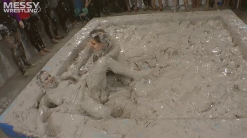 Muddy Wrestling: Satin, Skirts, and Audience Mud Blasted To The Max!  Everyone Gets A Taste! Screencap 53 on www.sinx.com