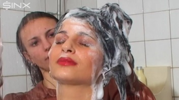 Raven Haired Babes Lather Up Their Hair Screencap 46 on www.sinx.com