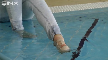 Fully Clothed Swimming For High Heeled Babe Screencap 9 on www.sinx.com