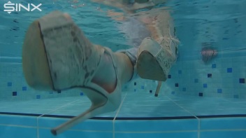 Fully Clothed Swimming For High Heeled Babe Screencap 20 on www.sinx.com