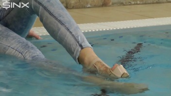 Fully Clothed Swimming For High Heeled Babe Screencap 24 on www.sinx.com