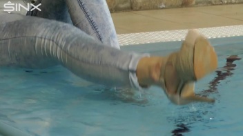 Fully Clothed Swimming For High Heeled Babe Screencap 25 on www.sinx.com