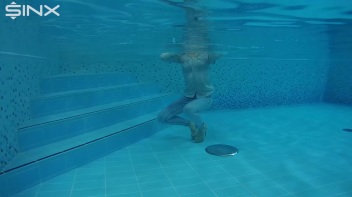 Fully Clothed Swimming For High Heeled Babe Screencap 51 on www.sinx.com