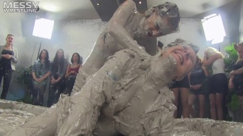 Muddy Wrestling: Satin, Skirts, and Audience Mud Blasted To The Max!  Everyone Gets A Taste! Screencap 26 on www.sinx.com