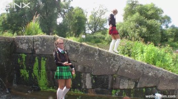 Soaking Wet Schoolgirls Splash In Waterfall Screencap 14 on www.sinx.com