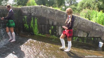 Soaking Wet Schoolgirls Splash In Waterfall Screencap 16 on www.sinx.com