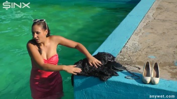 Waterpark Fun For Fully Clothed Brunette Babe Screencap 20 on www.sinx.com