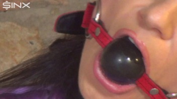 Handcuffed Hottie Drools Down Her Satin Blouse Screencap 2 on www.sinx.com