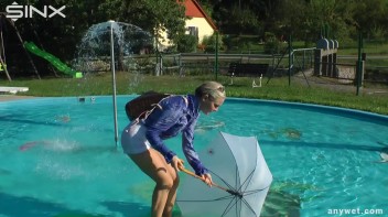Playful Blonde Gets Drenched Under Water Fountain Screencap 20 on www.sinx.com