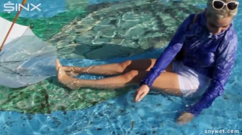 Playful Blonde Gets Drenched Under Water Fountain Screencap 23 on www.sinx.com