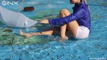Playful Blonde Gets Drenched Under Water Fountain Screencap 28 on www.sinx.com
