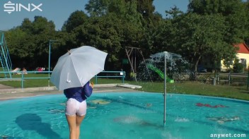 Playful Blonde Gets Drenched Under Water Fountain Screencap 29 on www.sinx.com