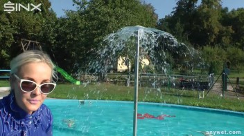 Playful Blonde Gets Drenched Under Water Fountain Screencap 32 on www.sinx.com
