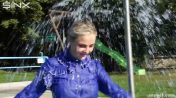 Playful Blonde Gets Drenched Under Water Fountain Screencap 35 on www.sinx.com