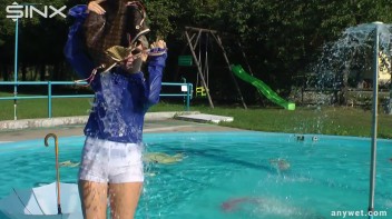 Playful Blonde Gets Drenched Under Water Fountain Screencap 39 on www.sinx.com