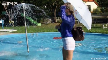 Playful Blonde Gets Drenched Under Water Fountain Screencap 43 on www.sinx.com