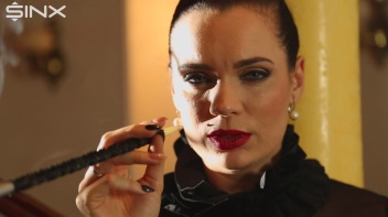 Seductive Babe With Red Lips Enjoys Smoking Screencap 21 on www.sinx.com