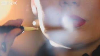 Seductive Babe With Red Lips Enjoys Smoking Screencap 9 on www.sinx.com