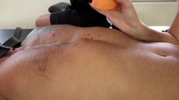 Two Sexy Dommes Torture Dude With Wax Screencap 15 on www.sinx.com