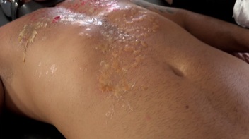 Two Sexy Dommes Torture Dude With Wax Screencap 21 on www.sinx.com