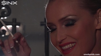 Blonde Tease Coyly Smoking Screencap 22 on www.sinx.com