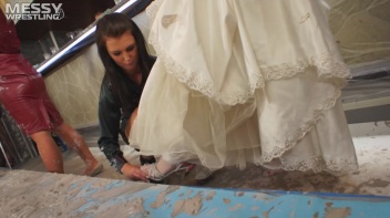 Muddy Wrestling: Bride Battle Screencap 5 on www.sinx.com