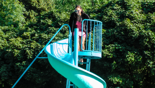 Latest deal - Waterpark Fun For Fully Clothed Brunette Babe