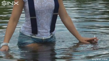 Seductive Blonde Smokes And Gets Drenched In Lake Screencap 17 on www.sinx.com