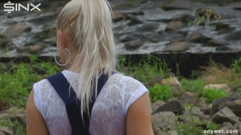 Seductive Blonde Smokes And Gets Drenched In Lake Screencap 28 on www.sinx.com