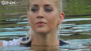 Seductive Blonde Smokes And Gets Drenched In Lake Screencap 32 on www.sinx.com