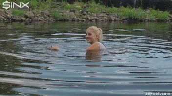Seductive Blonde Smokes And Gets Drenched In Lake Screencap 33 on www.sinx.com