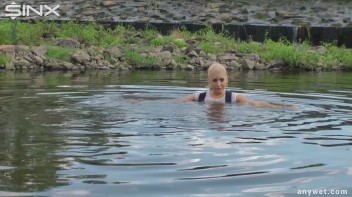 Seductive Blonde Smokes And Gets Drenched In Lake Screencap 34 on www.sinx.com
