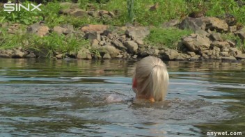 Seductive Blonde Smokes And Gets Drenched In Lake Screencap 40 on www.sinx.com
