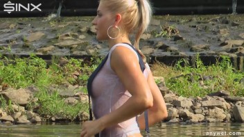 Seductive Blonde Smokes And Gets Drenched In Lake Screencap 41 on www.sinx.com