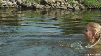 Seductive Blonde Smokes And Gets Drenched In Lake Screencap 44 on www.sinx.com